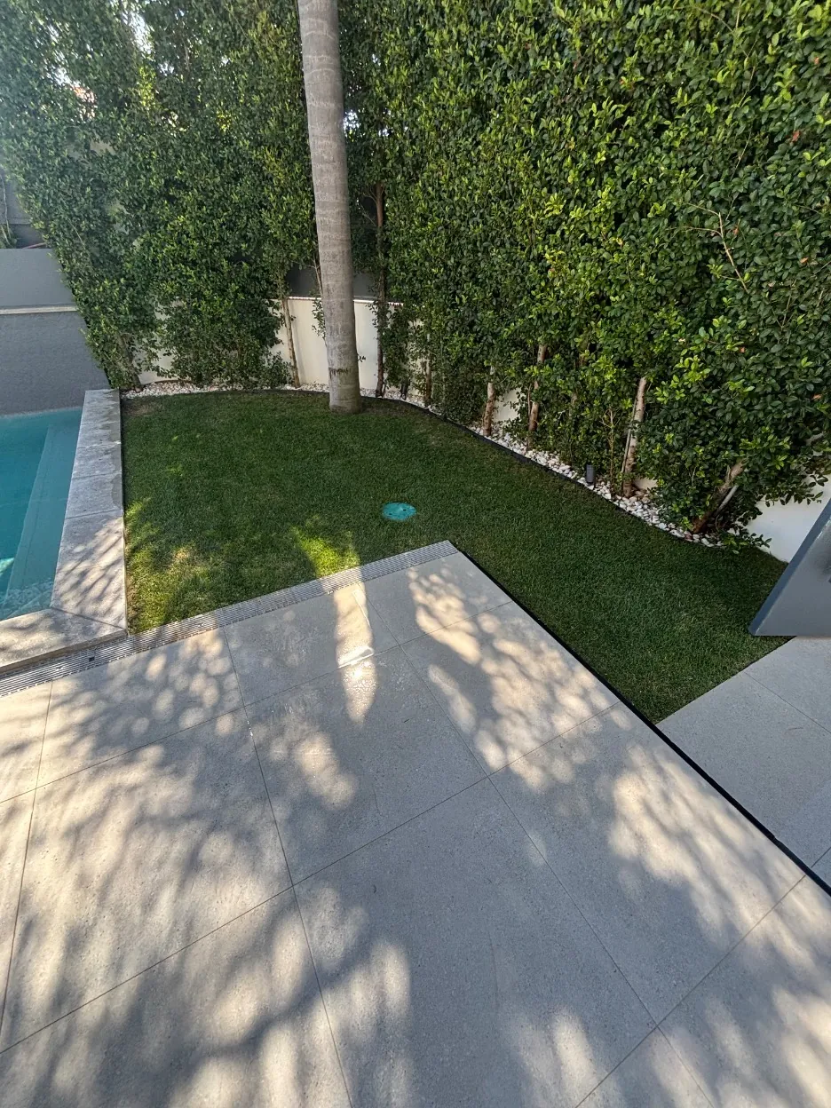 Lawn and hedge area after the visit